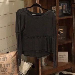 True Craft long sleeved crop top styled shirt.